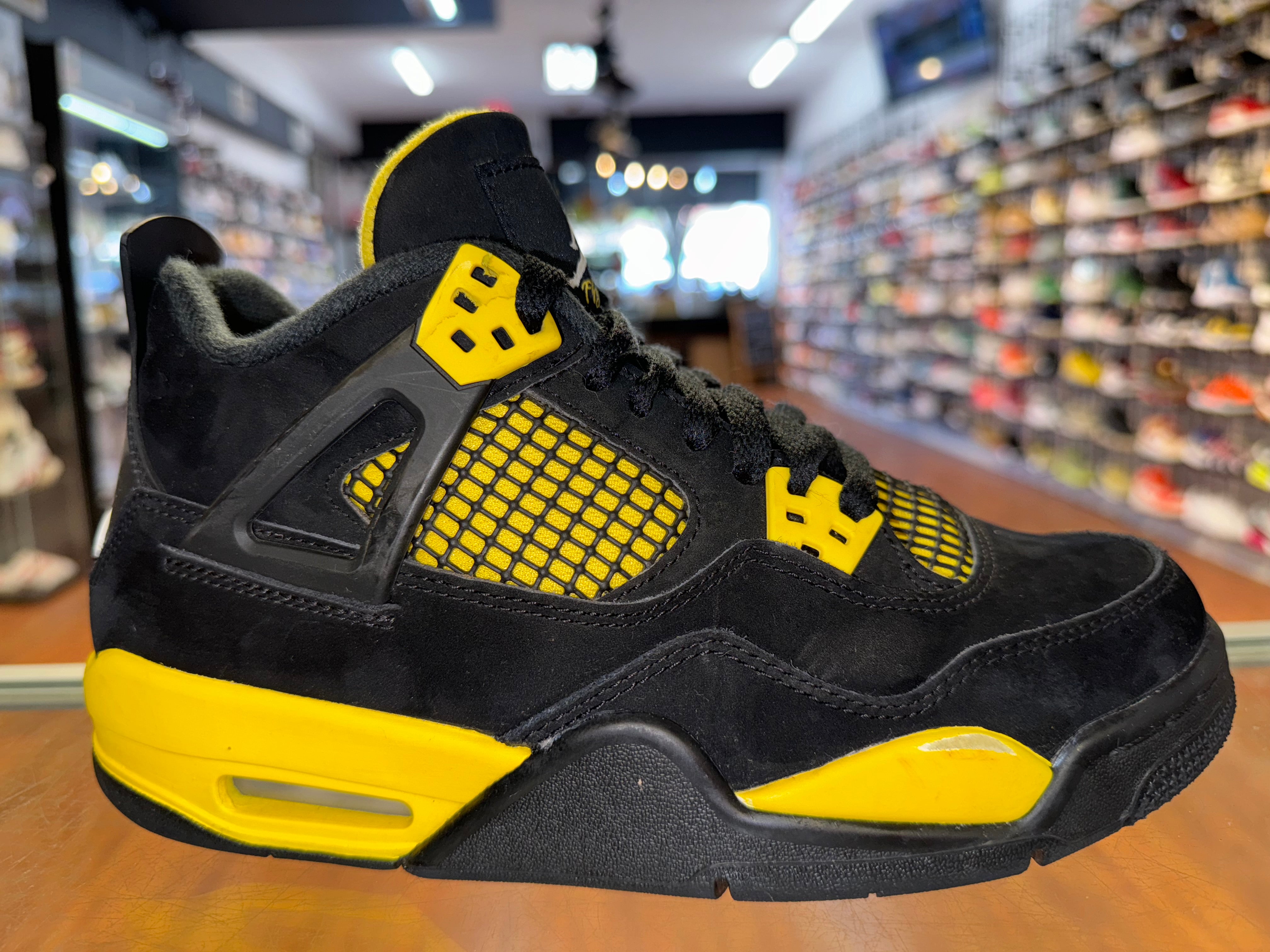 Size 6y Air Jordan 4 “Thunder”