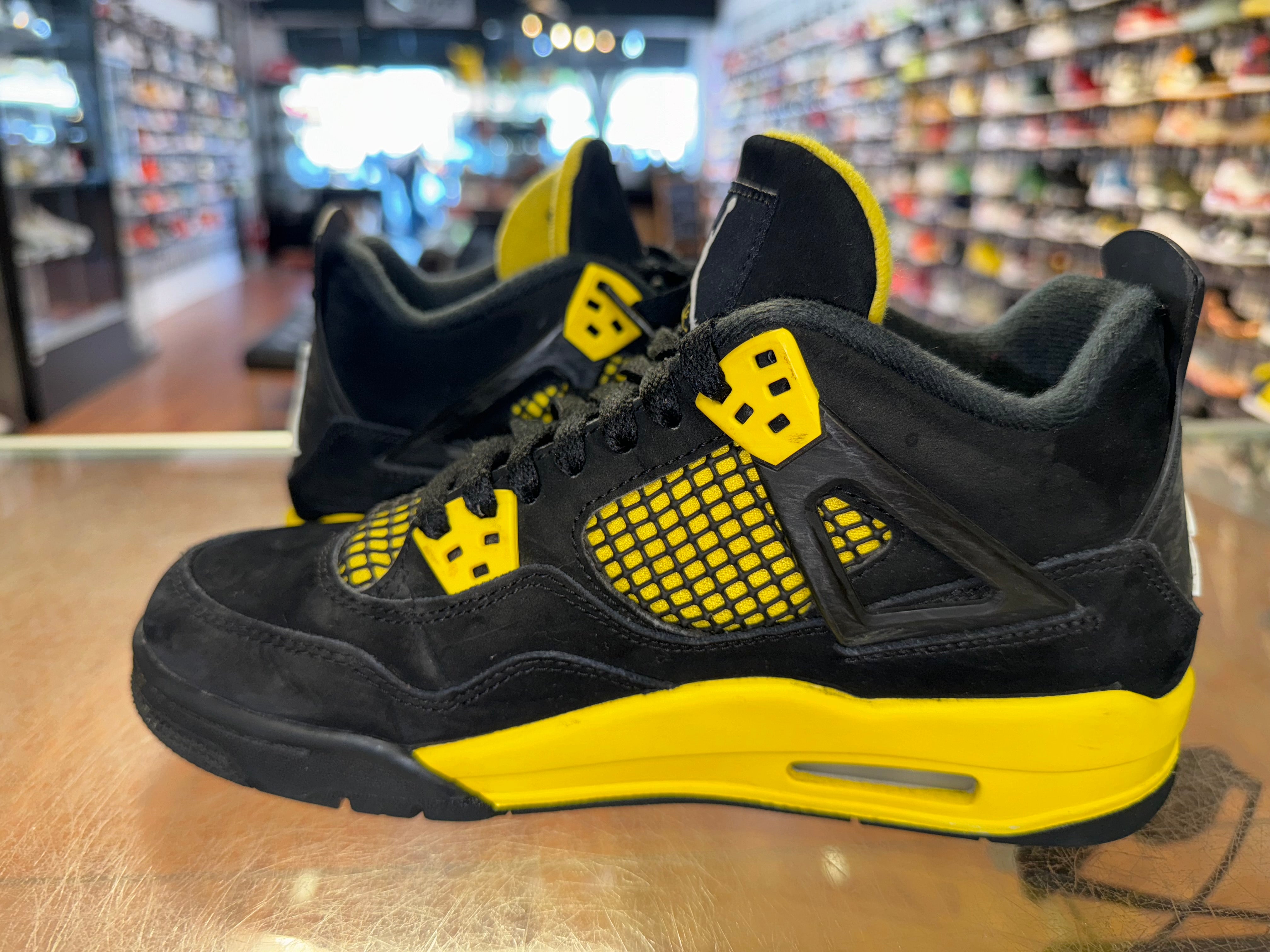 Size 6y Air Jordan 4 “Thunder”