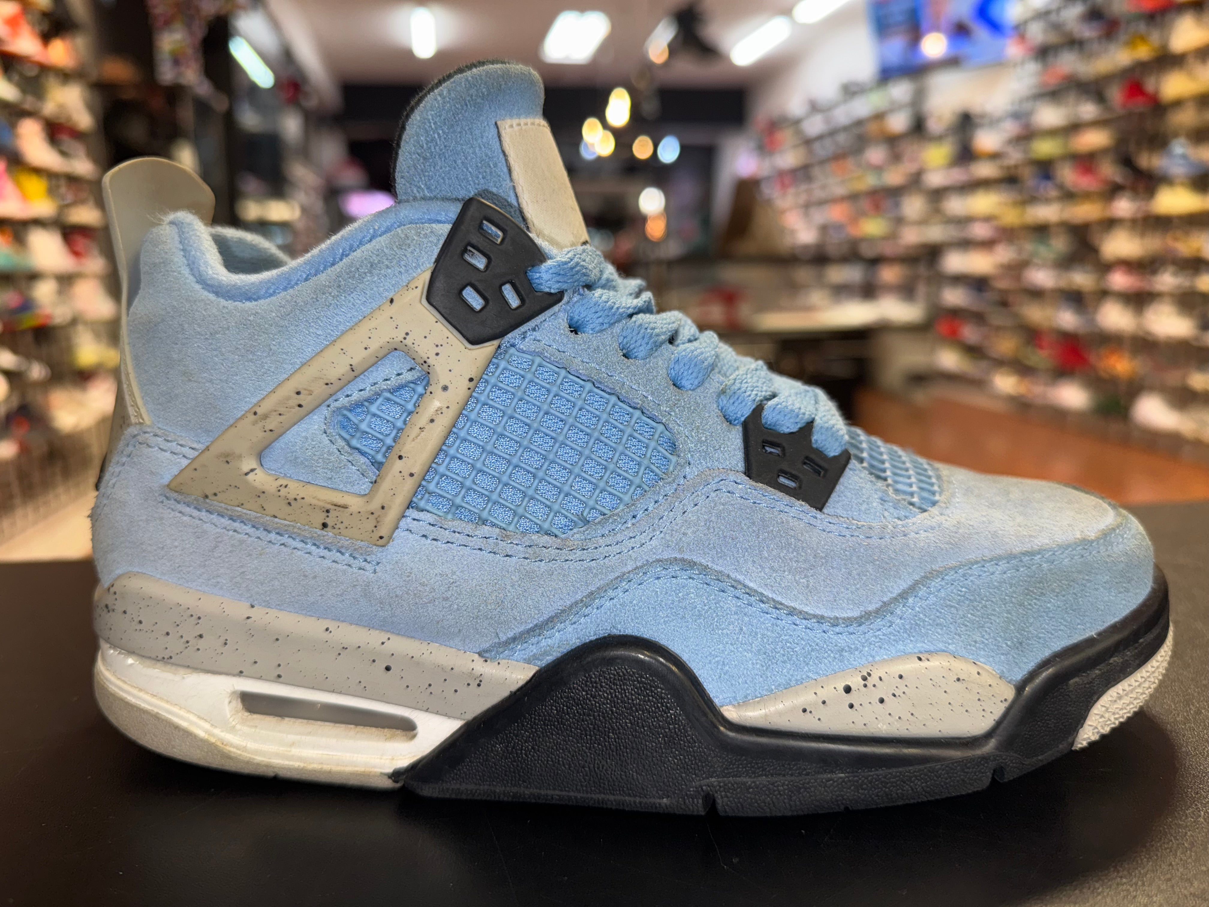 Size 4.5y Air Jordan 4 “University Blue”