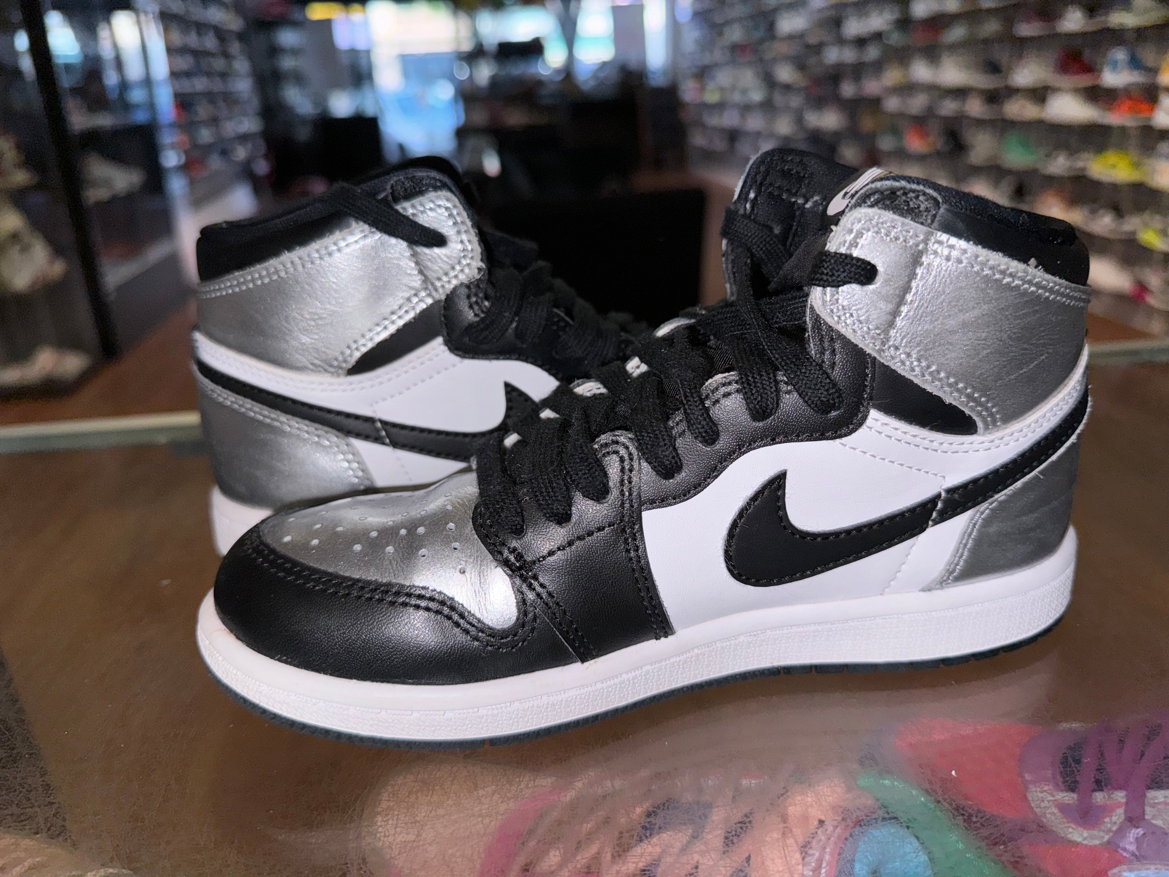 Size 1.5y Air Jordan 1 “Silver Toe”