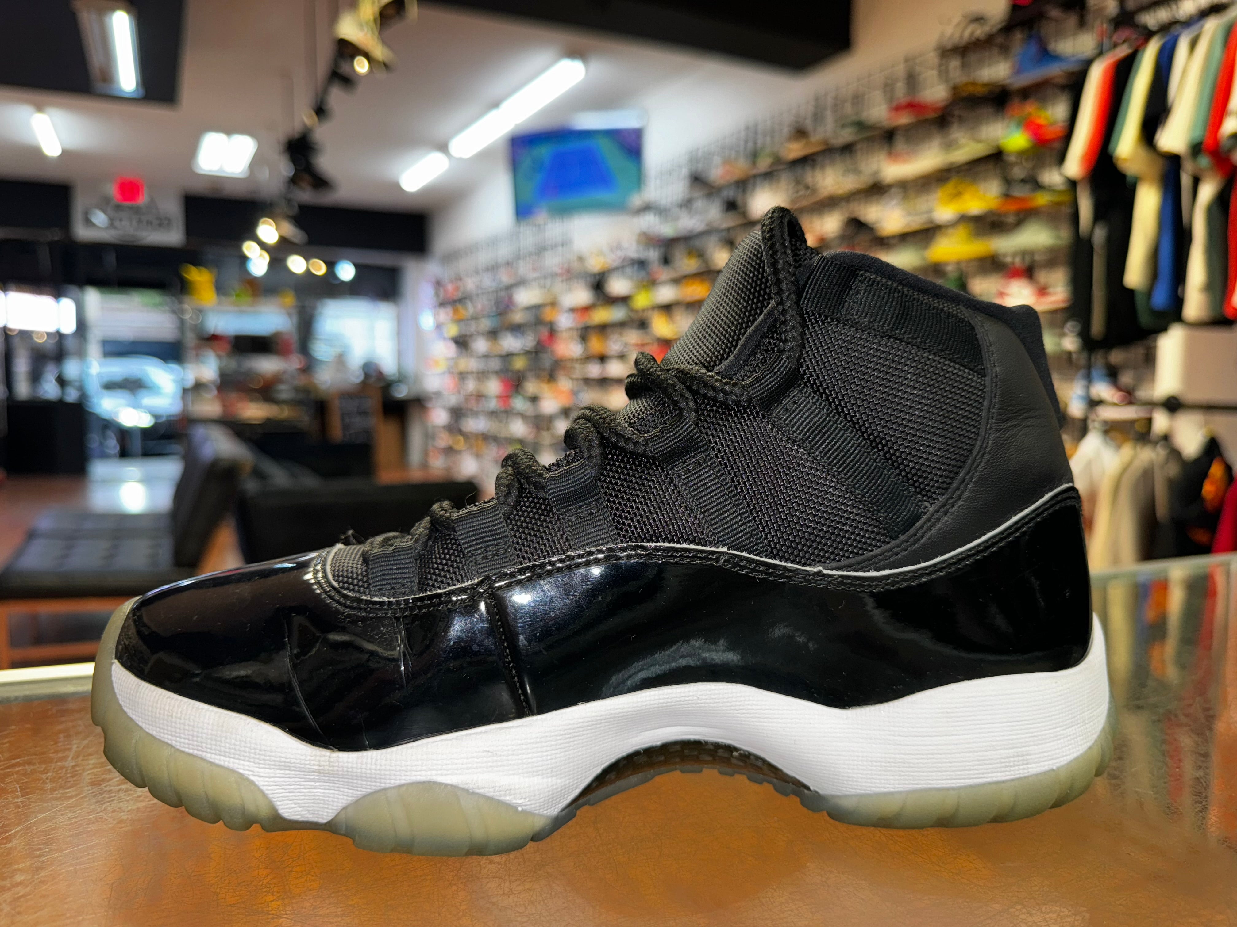 Size 8 Air Jordan 11 "Space Jam"