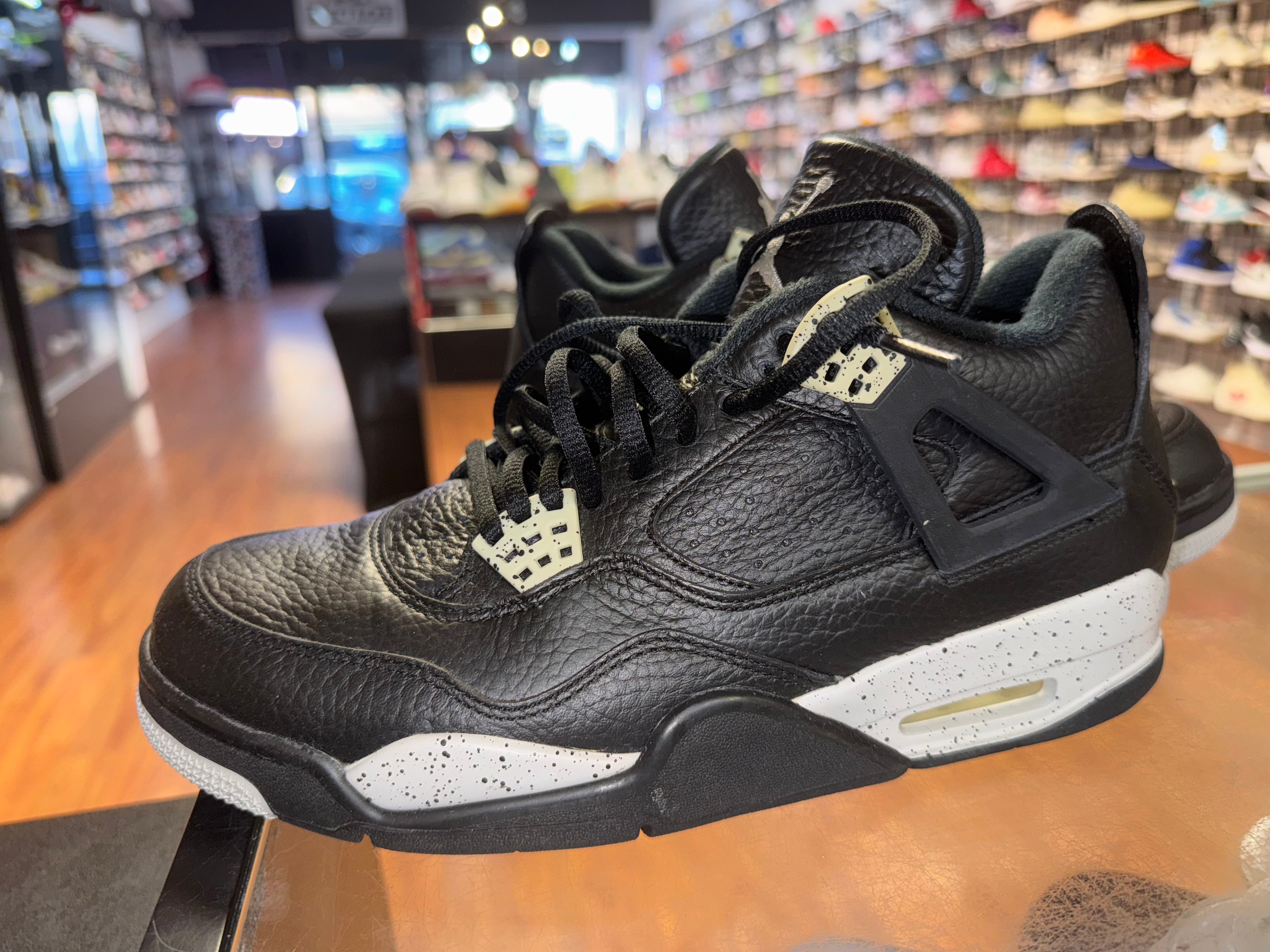 Size 9.5 Air Jordan 4 “Black Oreo”