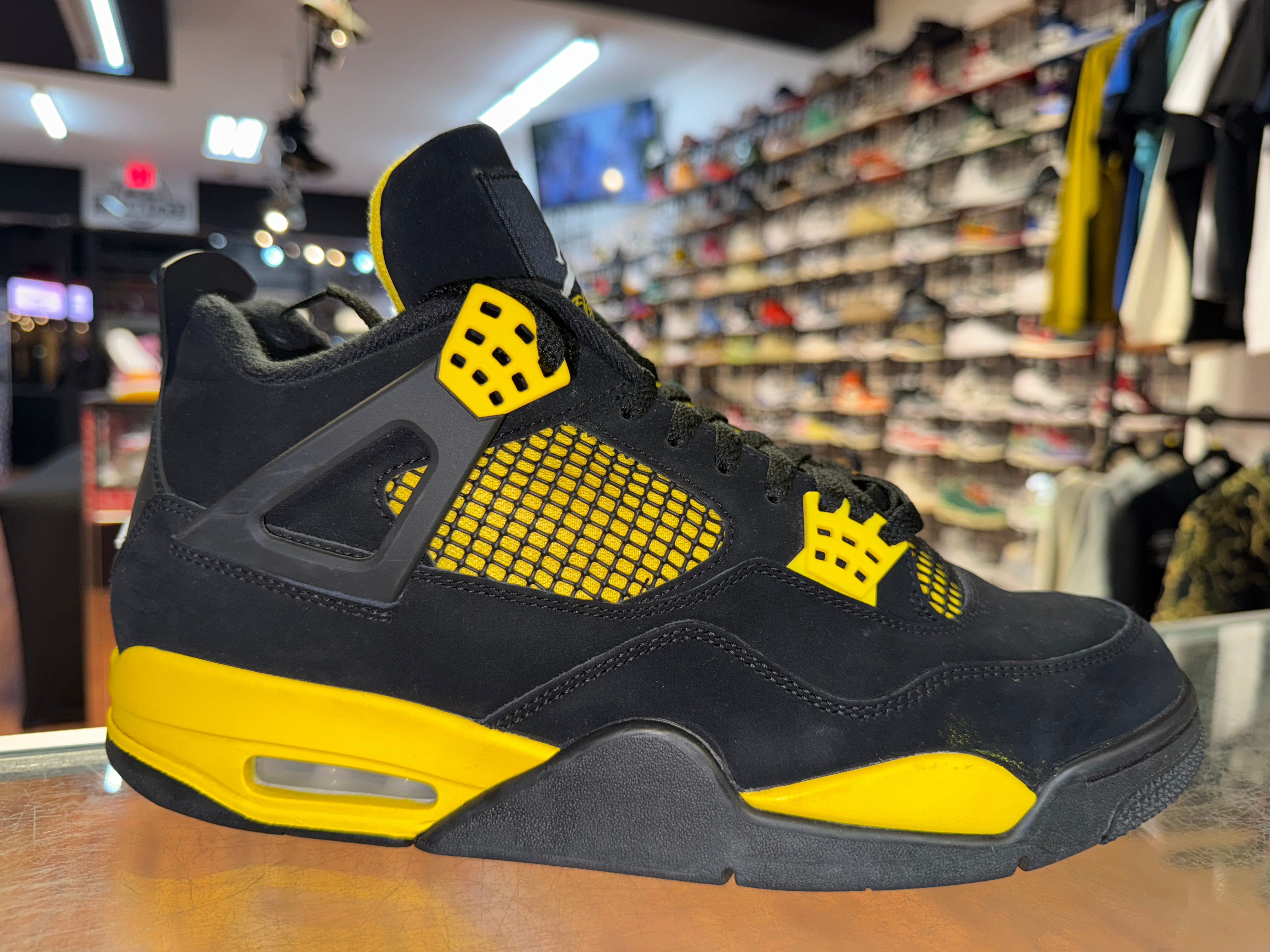 Size 11.5 Air Jordan 4 "Thunder"