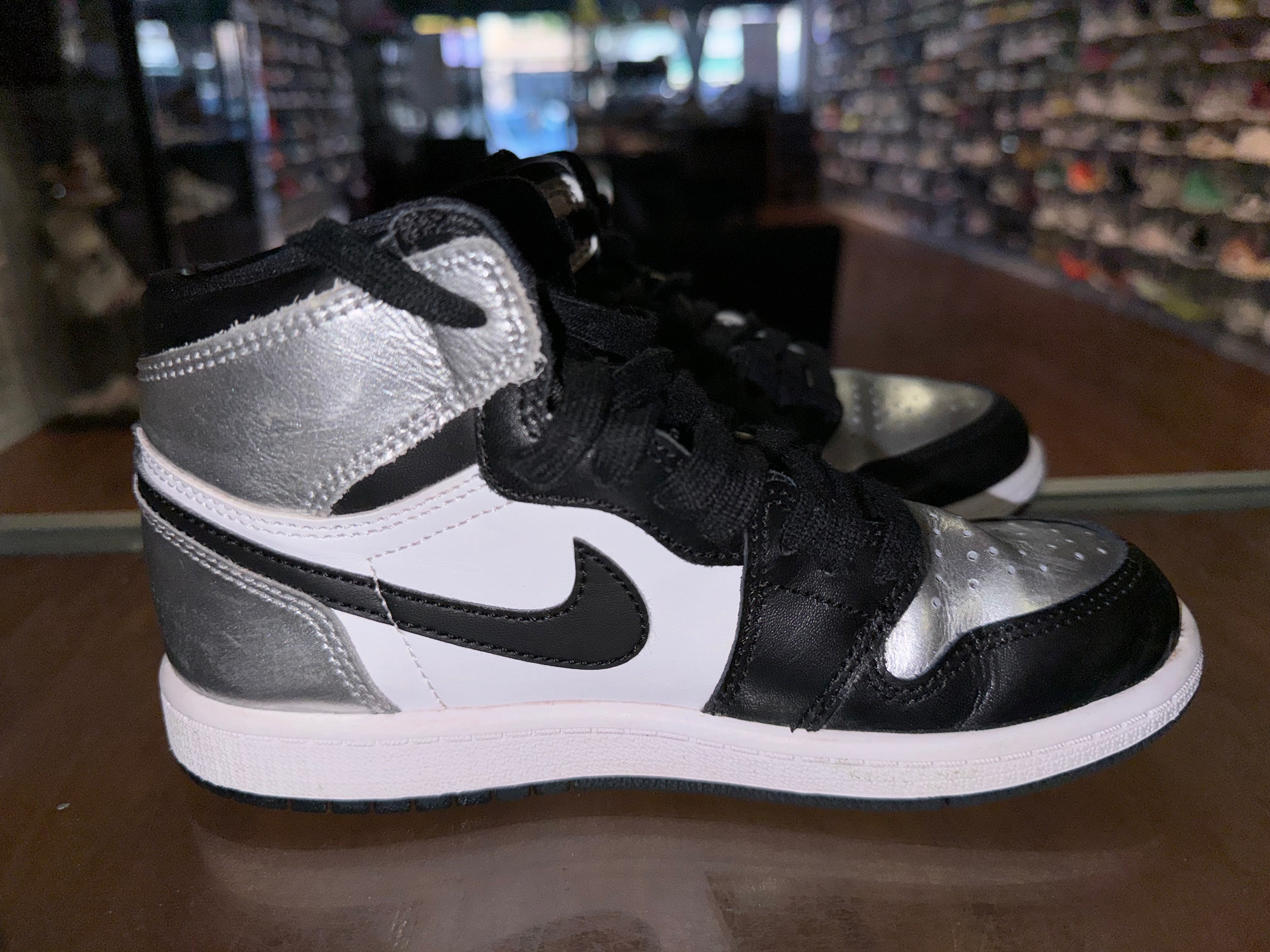 Size 1.5y Air Jordan 1 “Silver Toe”