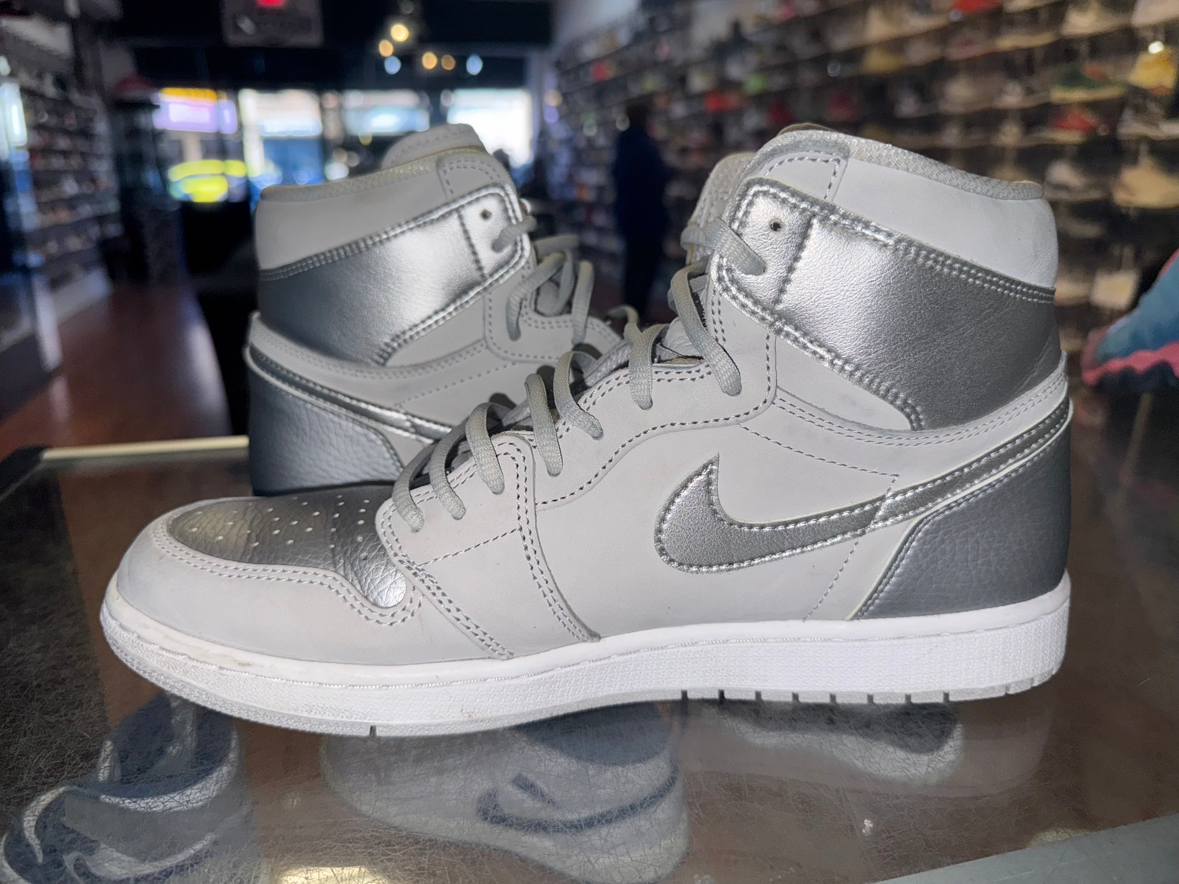 Size 11.5 Air Jordan 1 “COJP Silver”