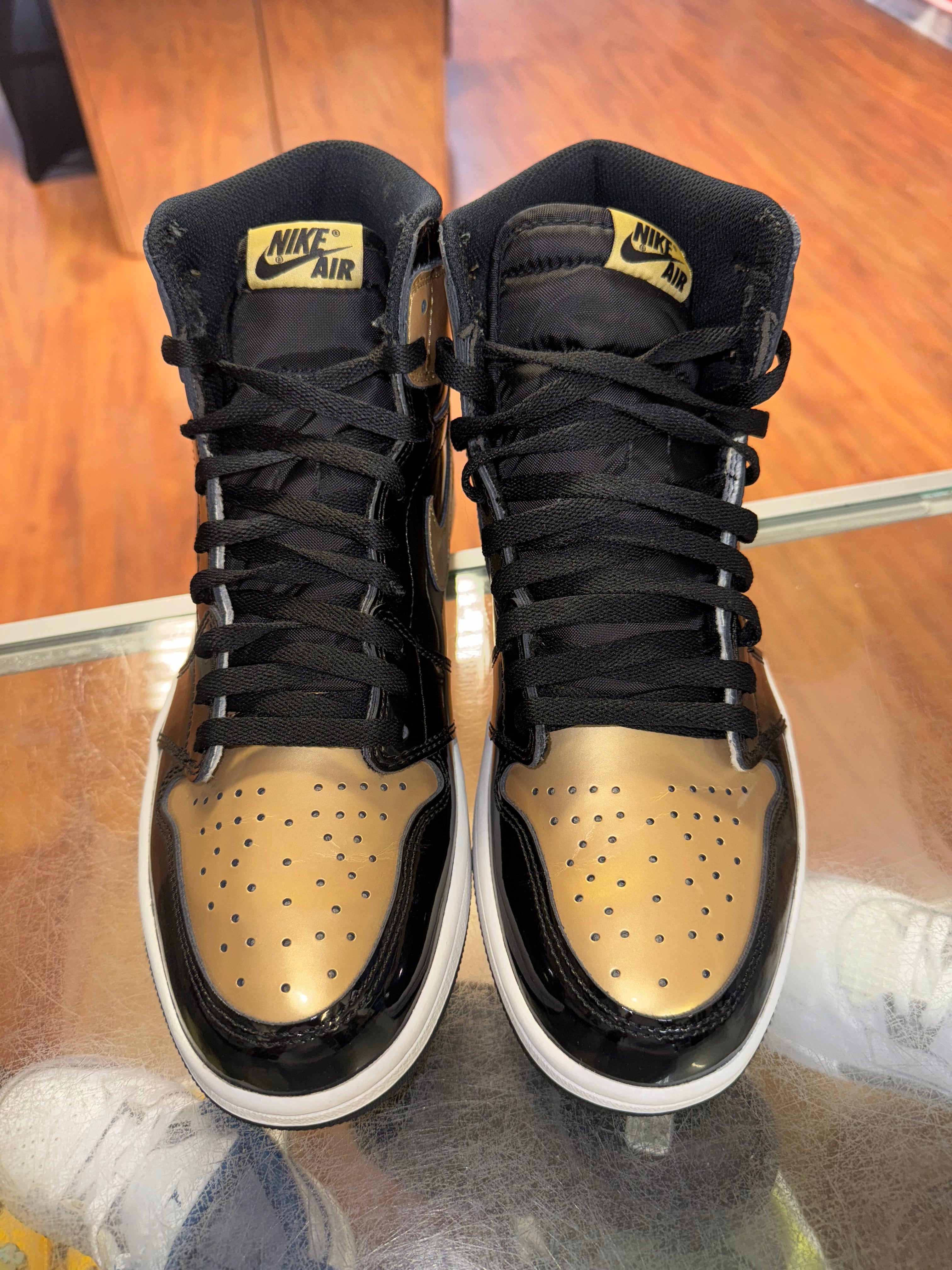 Size 10 Air Jordan 1 "Gold Toe"