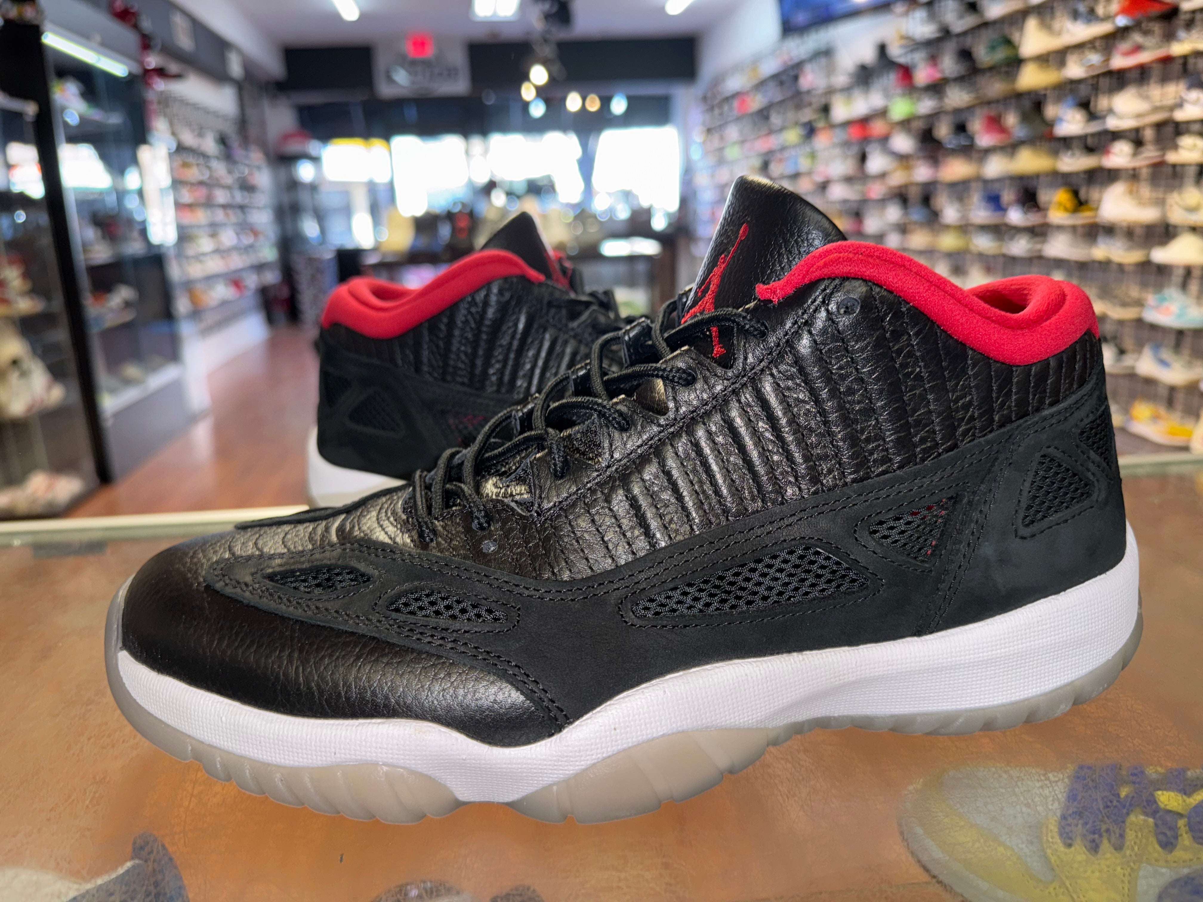 Size 11 Air Jordan 11 Low IE “Black Cement”