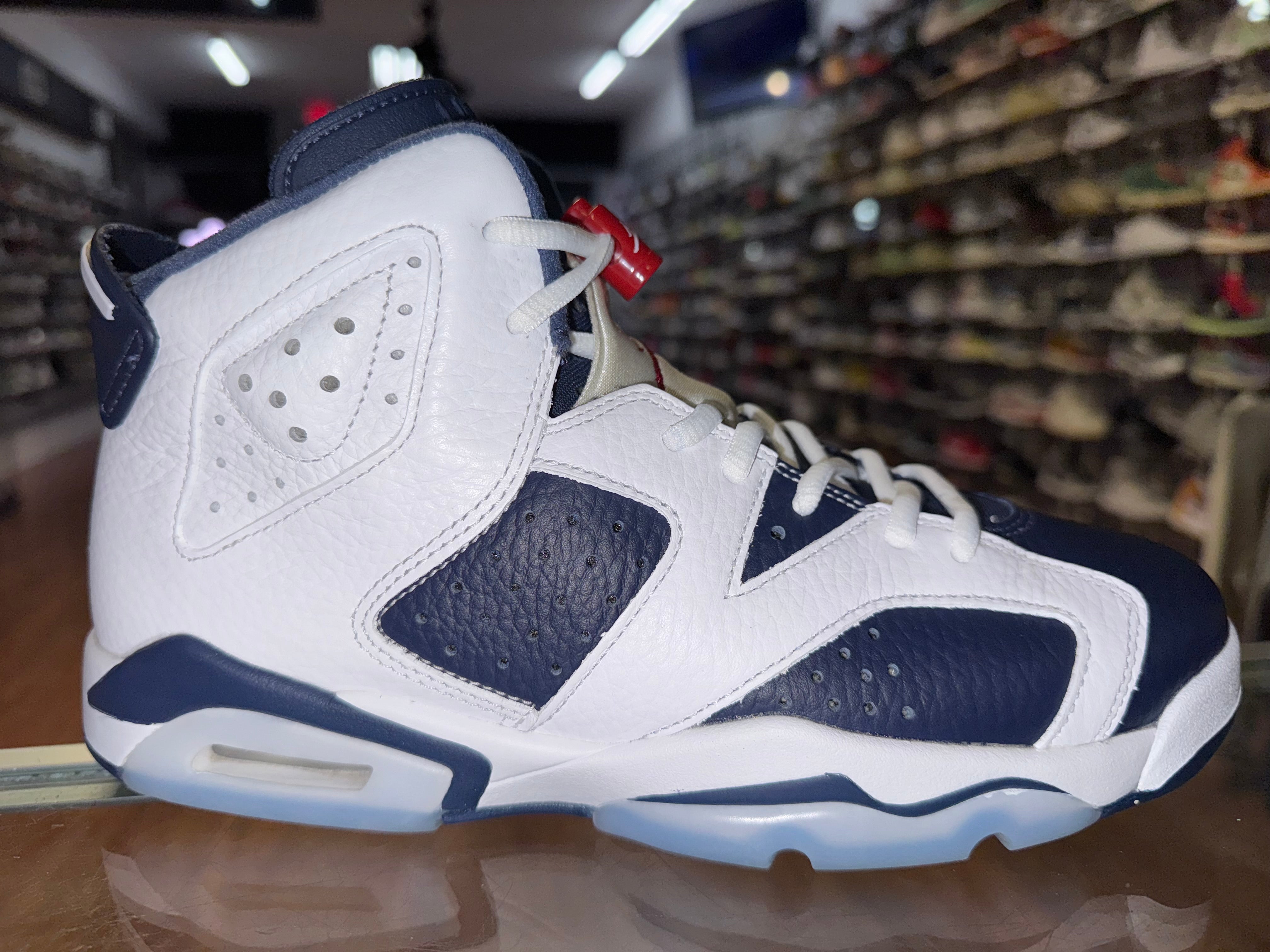 Size 7y Air Jordan 6 "Olympic"