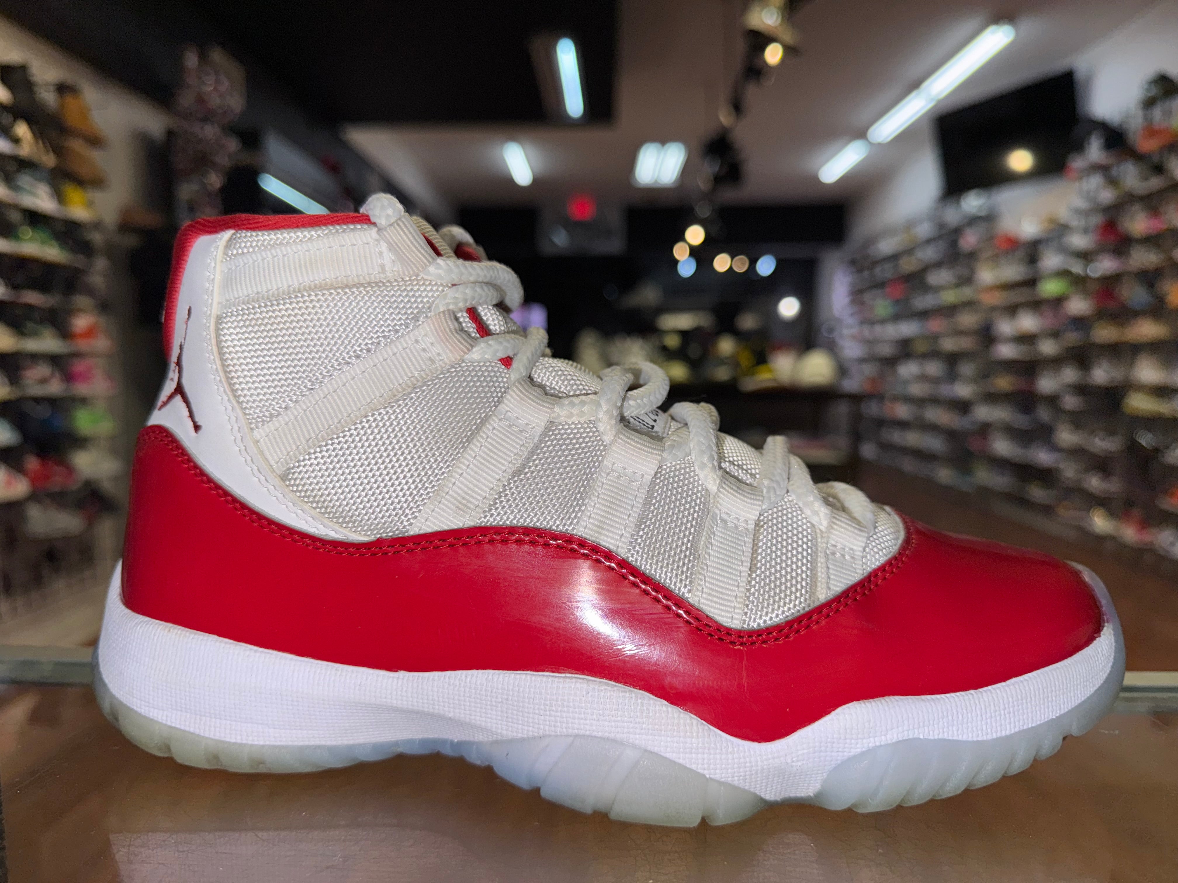 Size 7 Air Jordan 11 "Cherry"