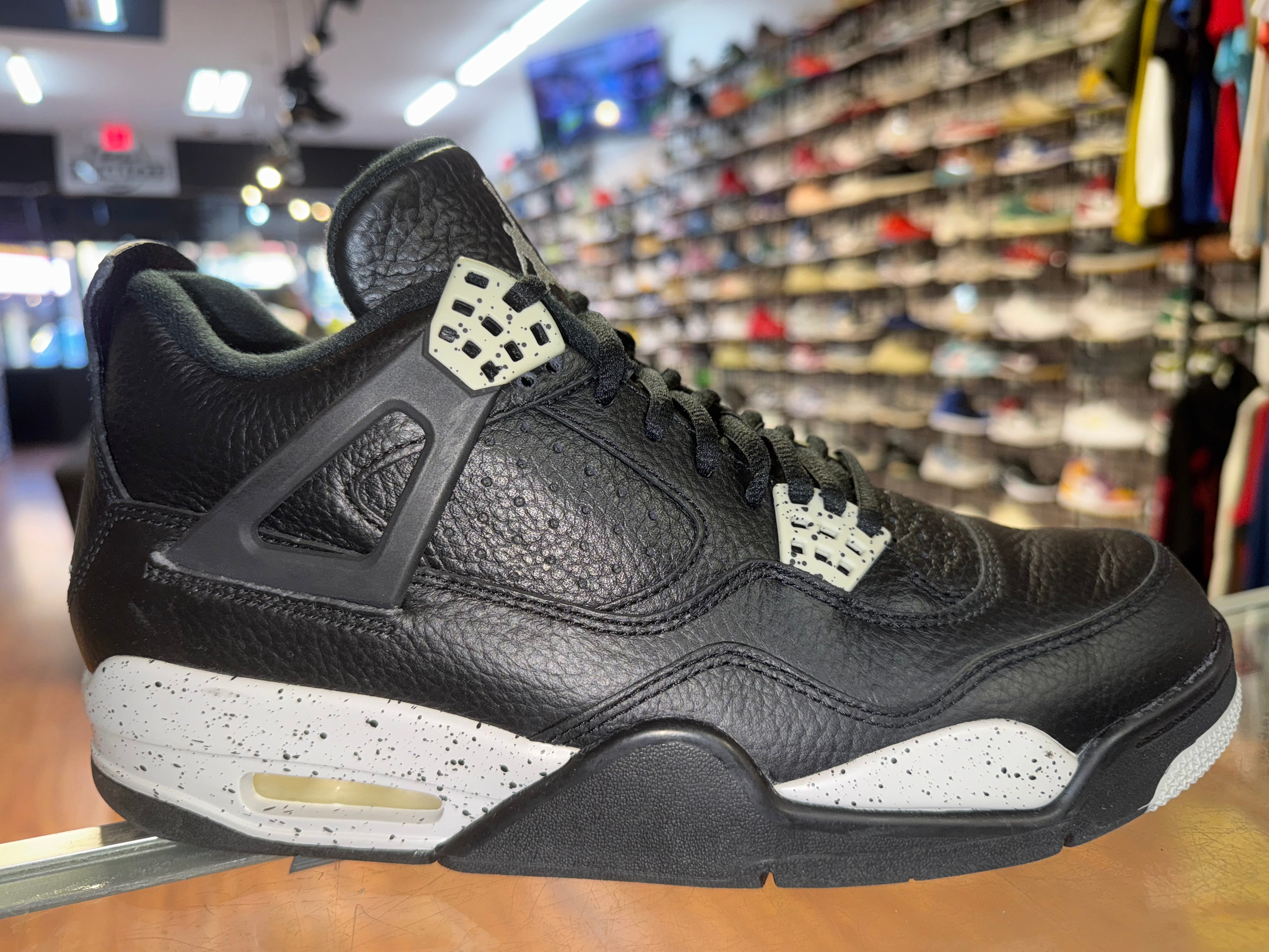 Size 9.5 Air Jordan 4 “Black Oreo”