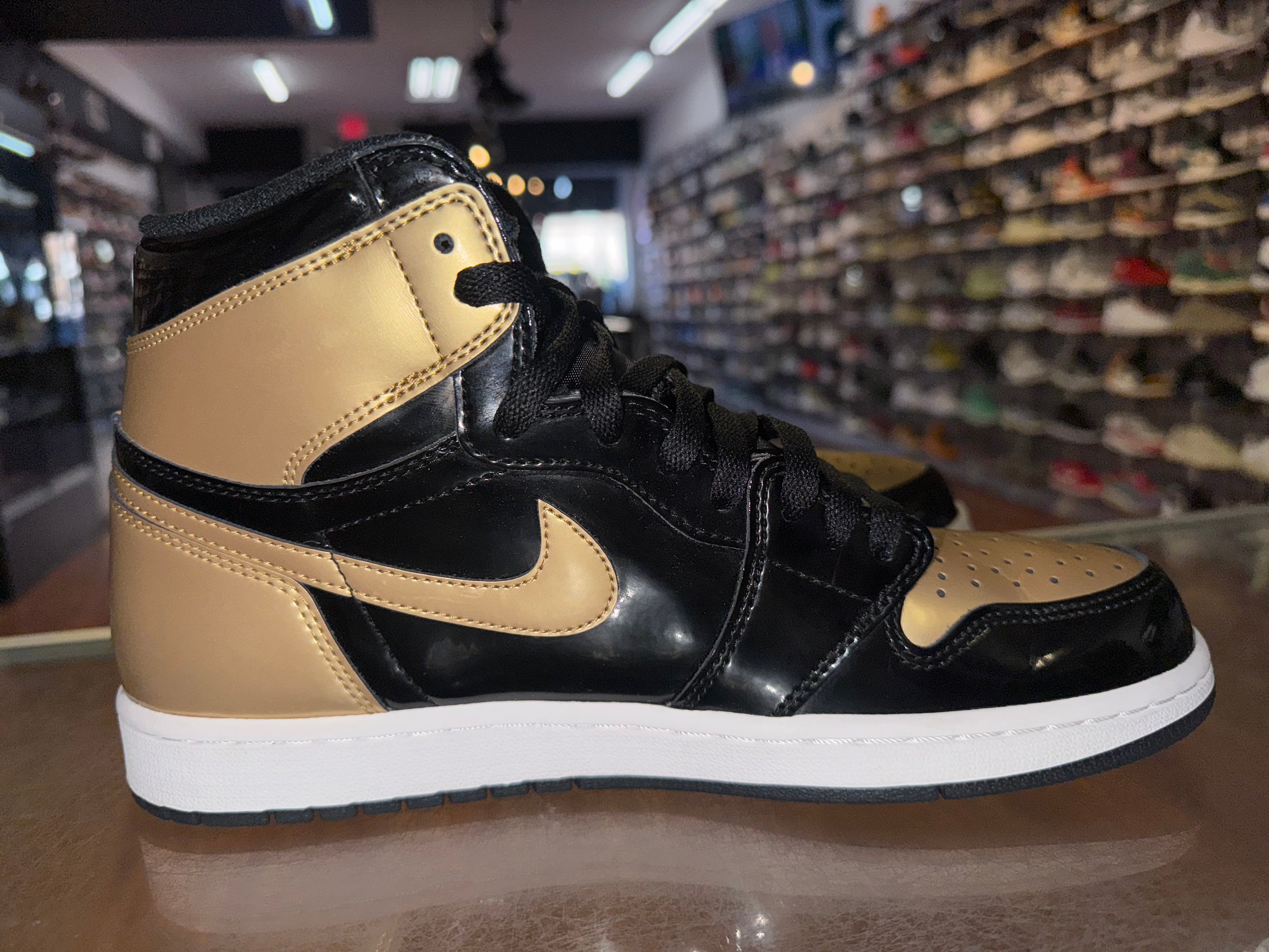 Size 10 Air Jordan 1 "Gold Toe"