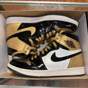 Size 9.5 Air Jordan 1 "Gold Toe"