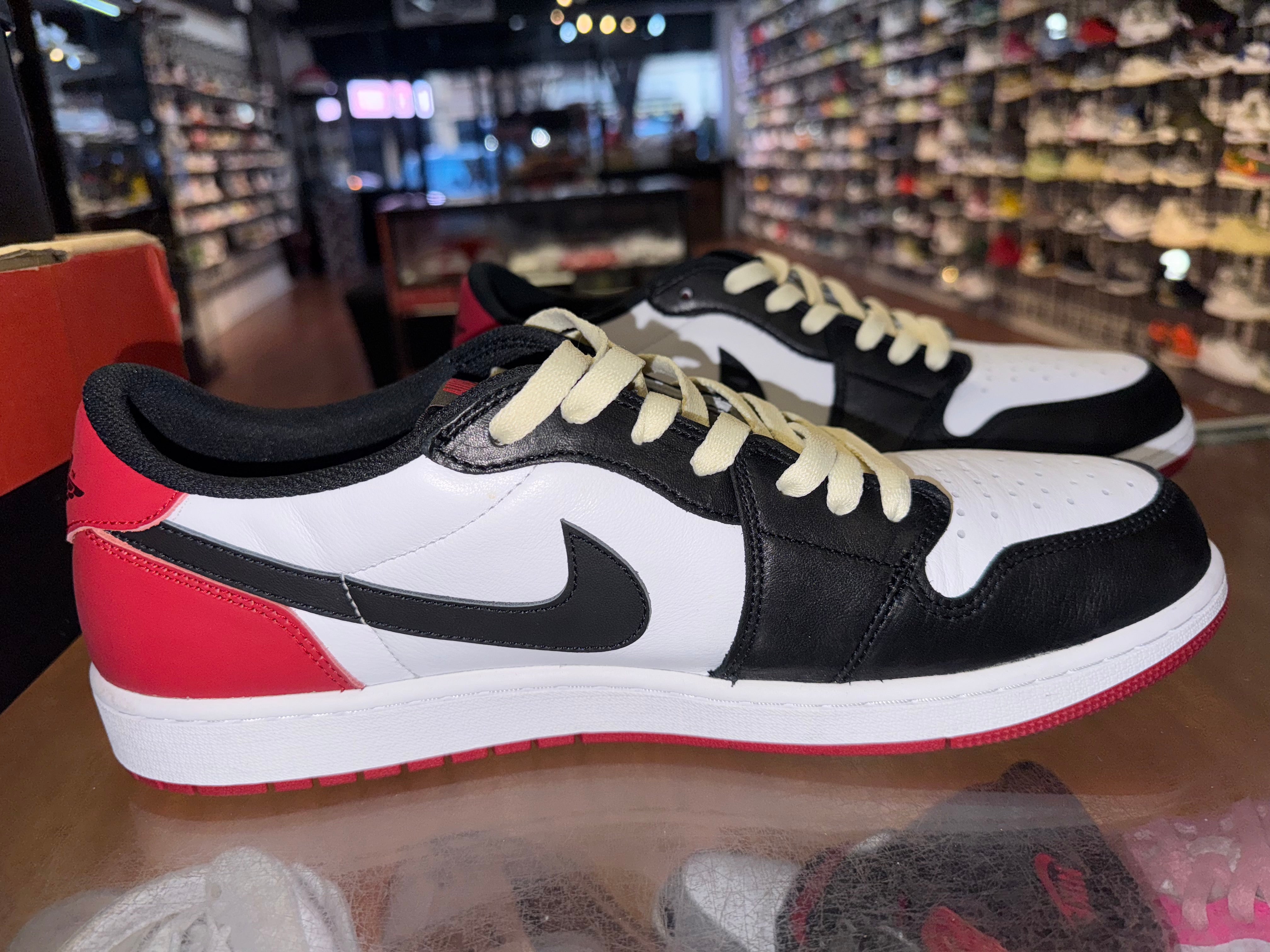 Size 14 Air Jordan 1 Low "Black Toe"