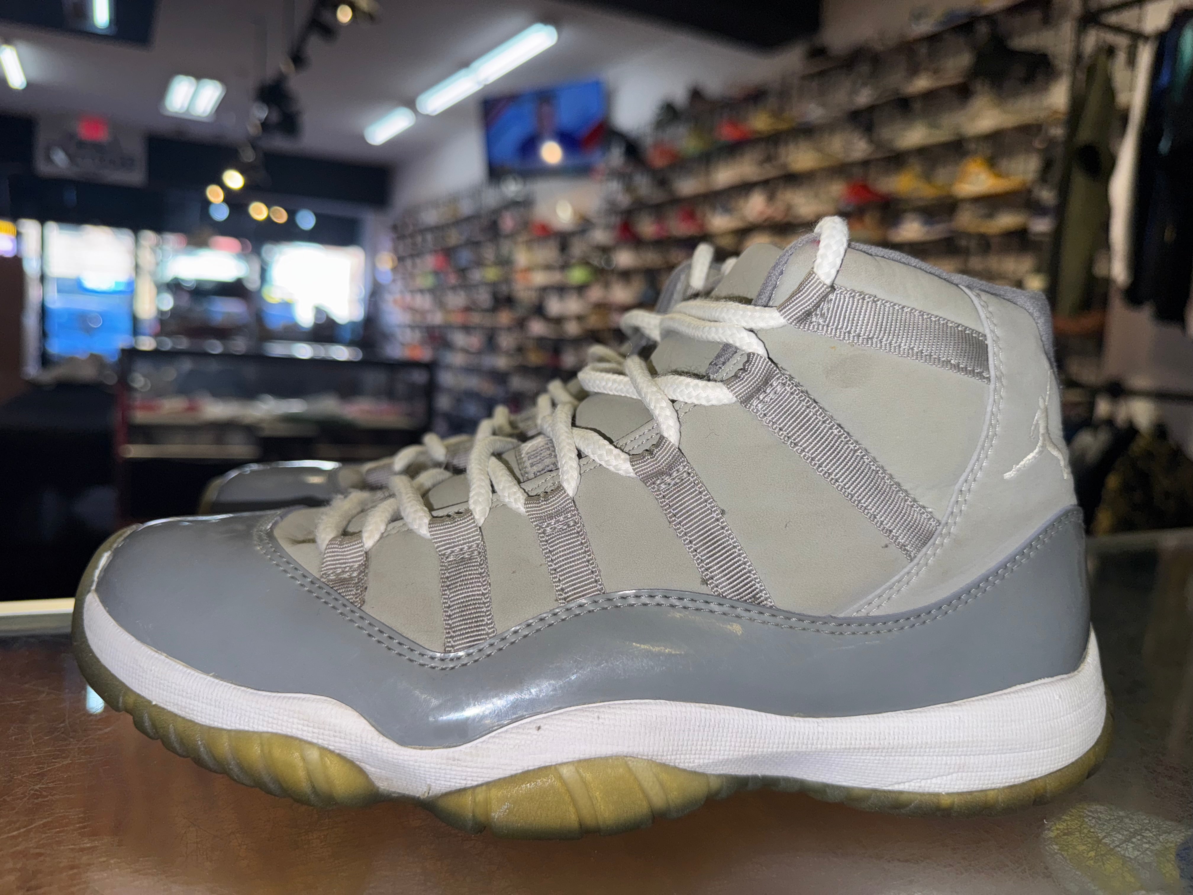 Size 8.5 Air Jordan 11 "Cool Grey" 2010