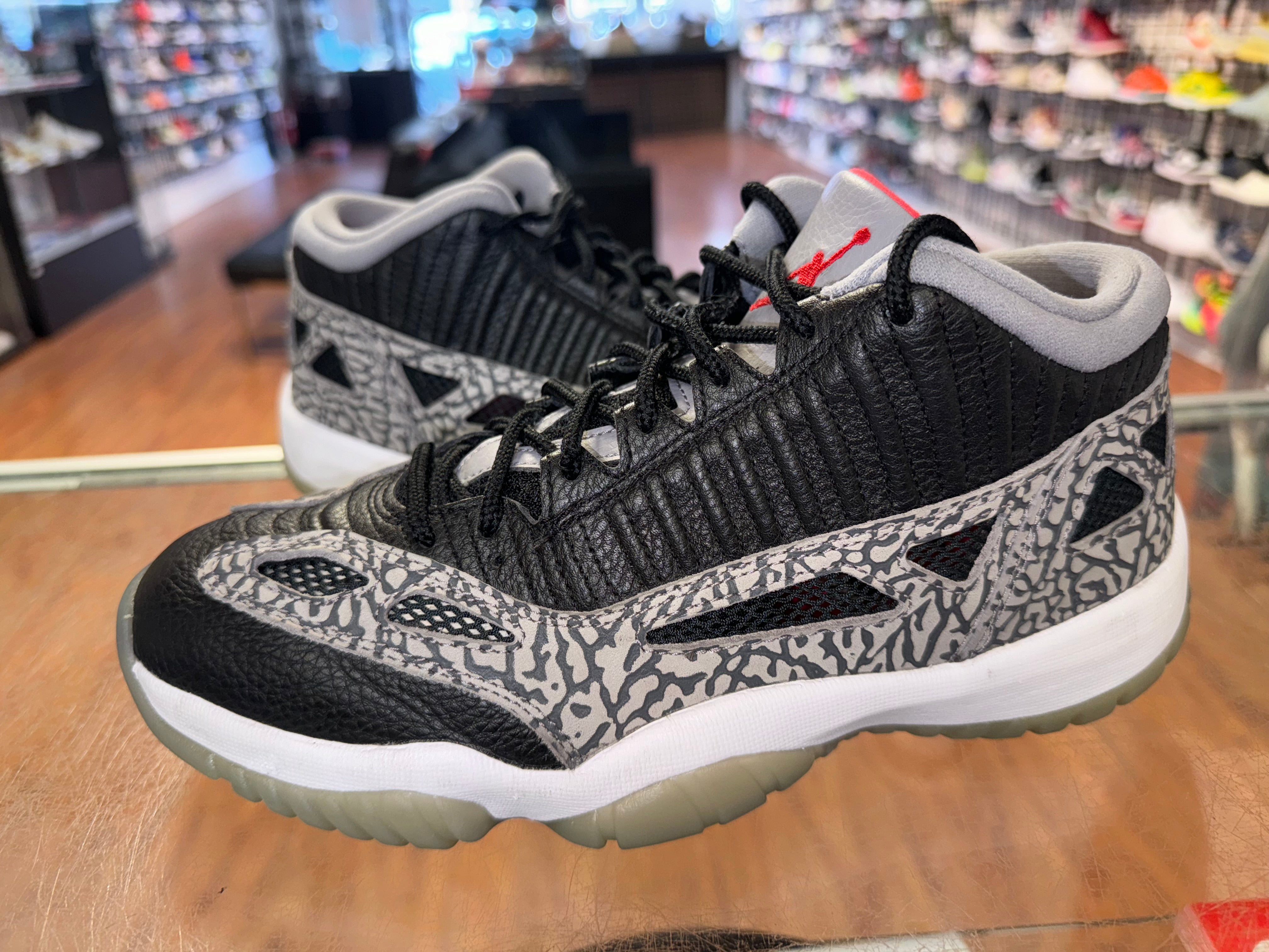 Size 8.5 Air Jordan 11 Low IE “Black Cement”