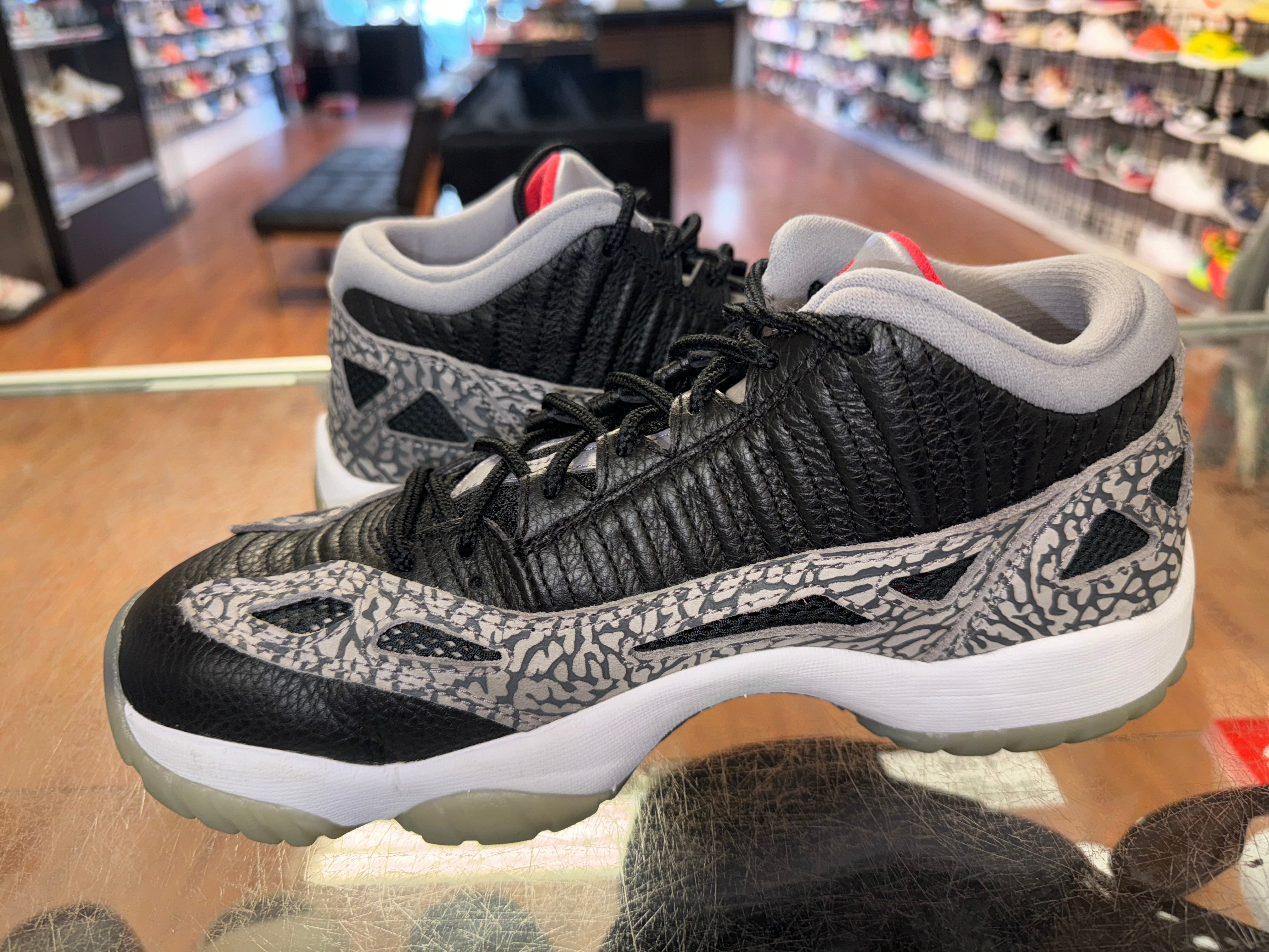 Size 8.5 Air Jordan 11 Low IE “Black Cement”