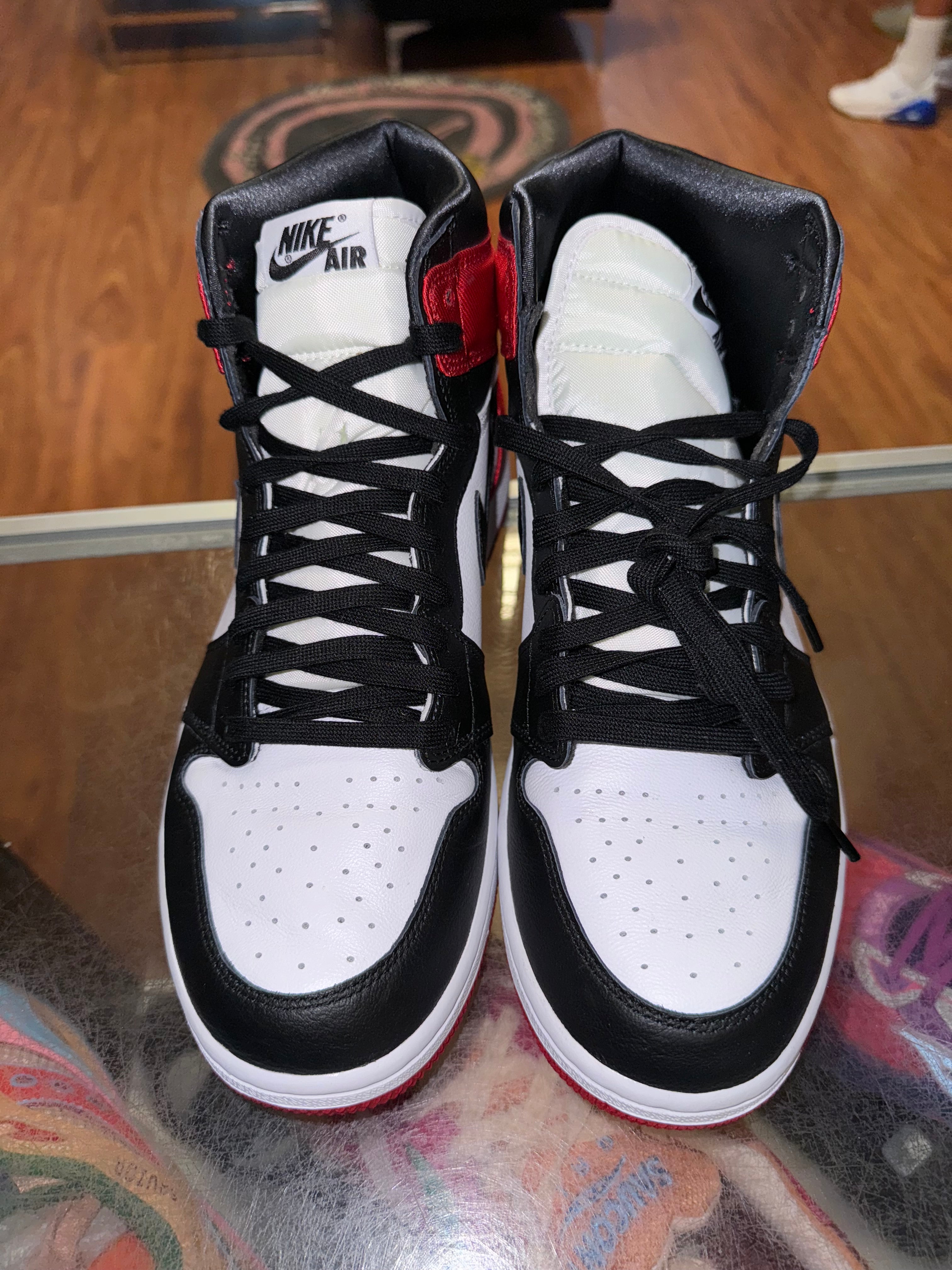 Size 9.5 (11W) Air Jordan 1 “Satin Black Toe”