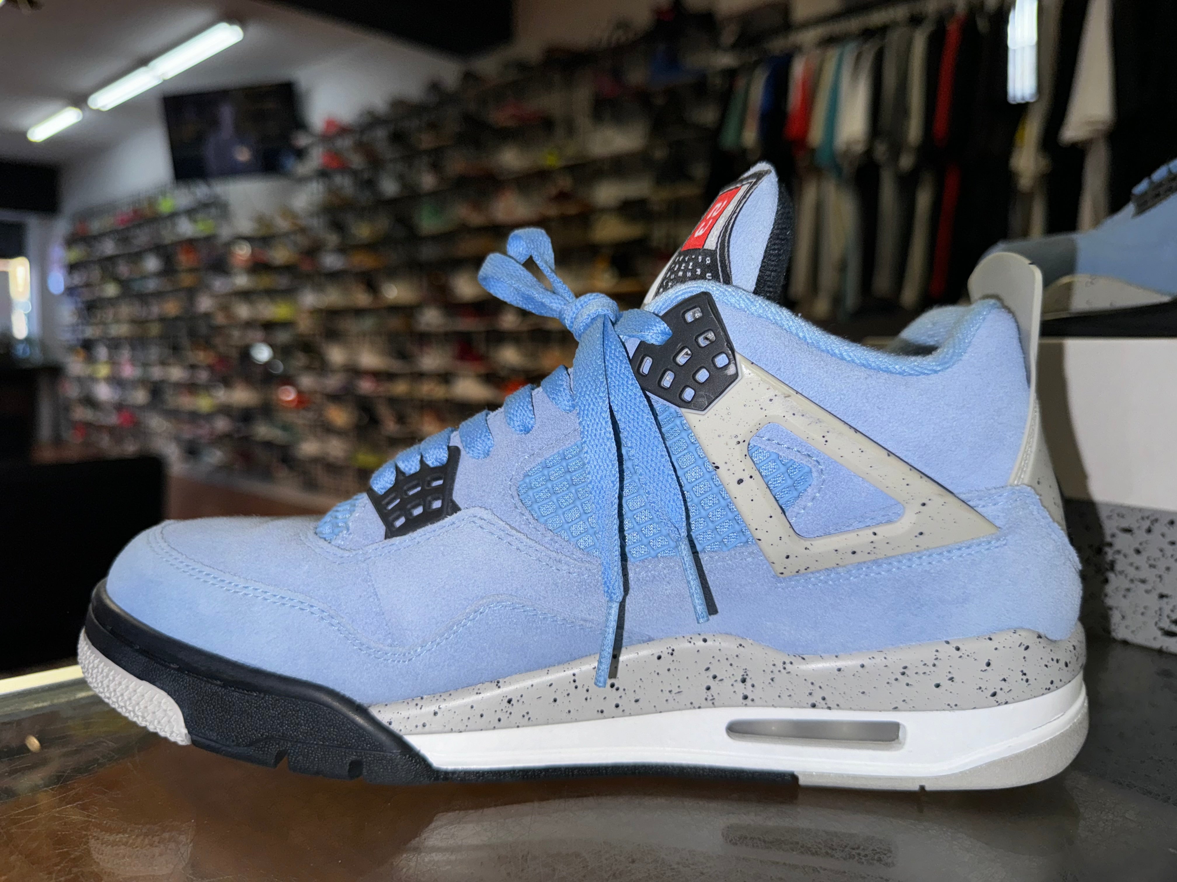 Size 9 Air Jordan 4 "UNC"