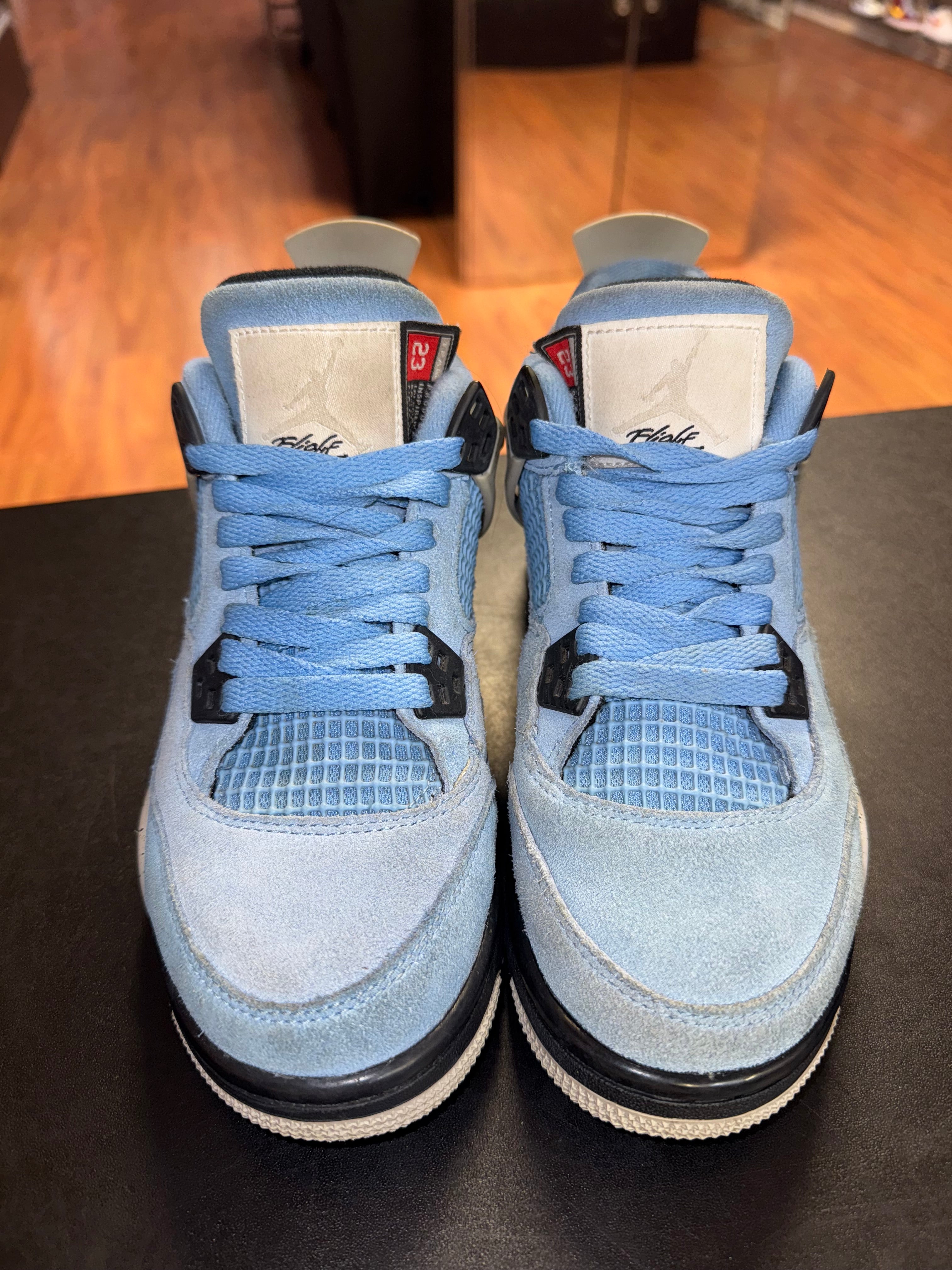 Size 4.5y Air Jordan 4 “University Blue”