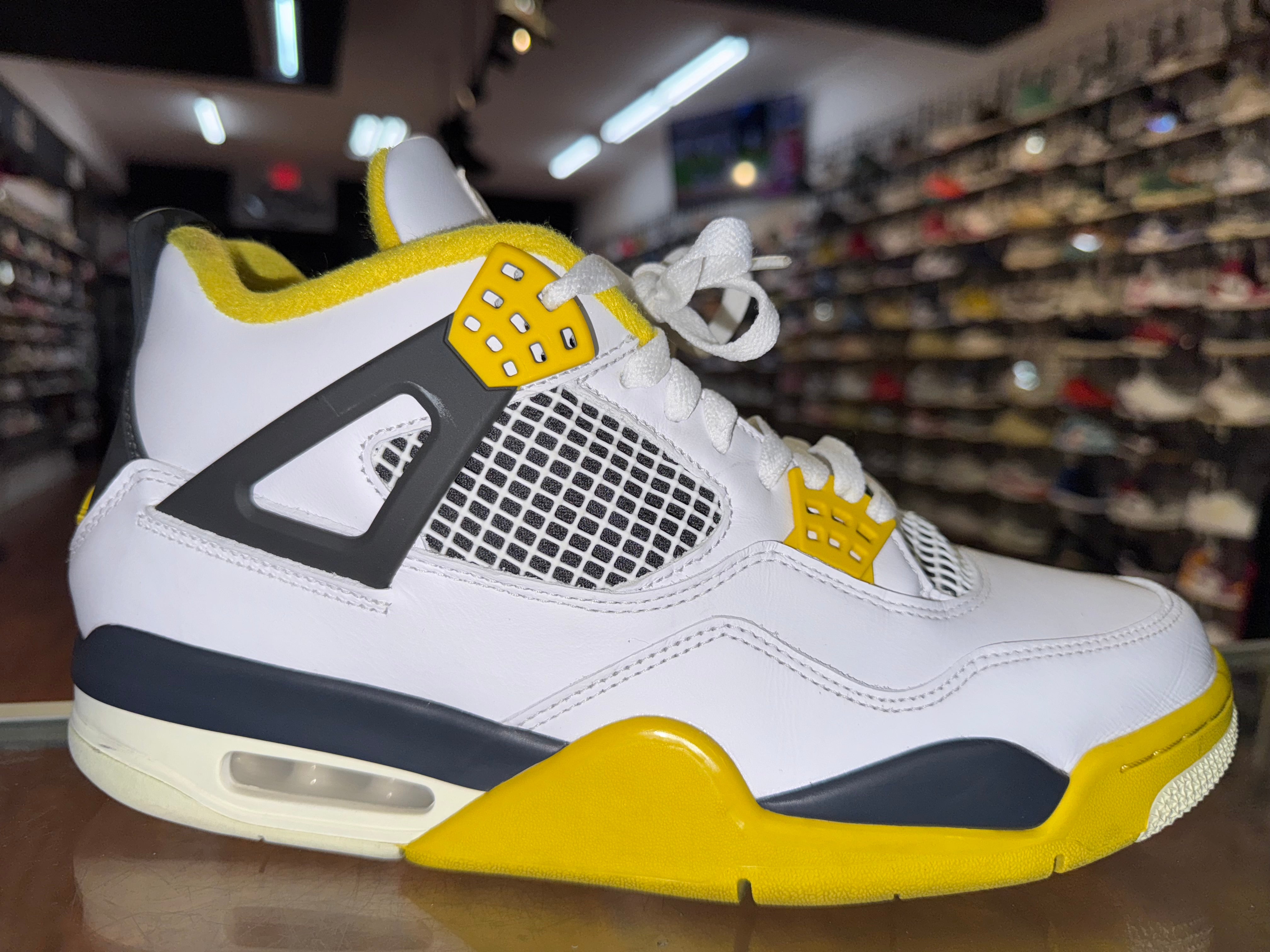 Size 10.5 (12W) Air Jordan 4 "Vivid Sulfur"